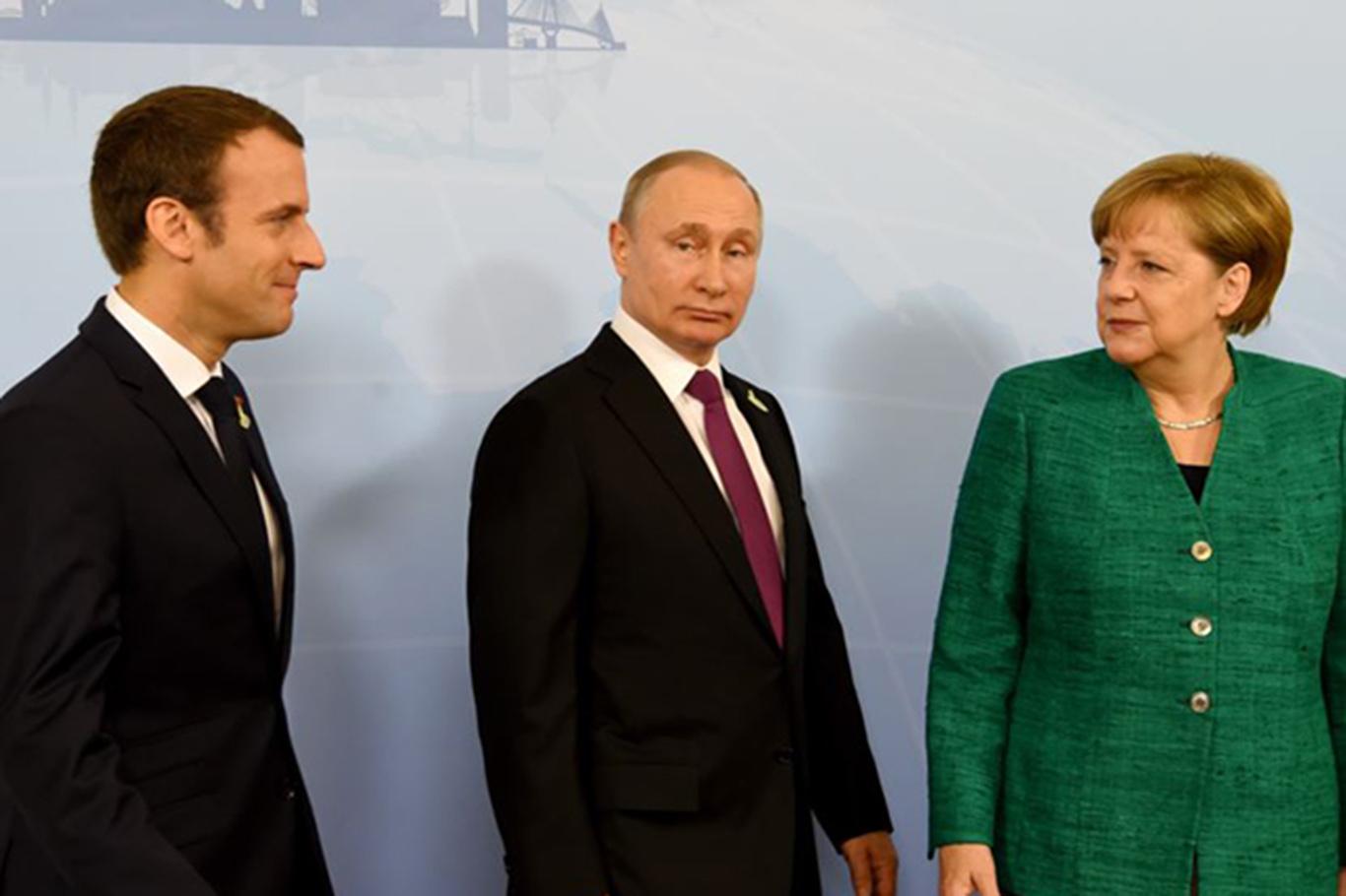 Putin, Merkel ve Macron'la Suriye'yi görüştü